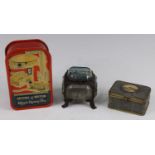 A 1951 Festival of Britain Magic Money box, printed with various Festival buildings, h.12.5cm,