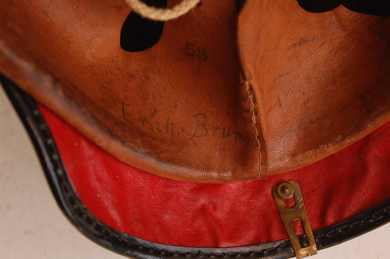 A Prussian pickelhaube, the leather skull with brass ball top and eagle plate, flanked by state - Image 9 of 9