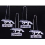 A set of four decanter labels, each in textured silver and surmounted by a fox, annotated for