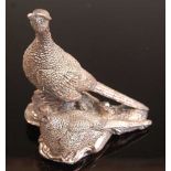 A comtemporary filled silver table ornament in the form of a cock and hen pheasant, maker Camelot