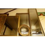 A modern gilt framed and bevelled rectangular wall mirror, 122x37cm; together with three other