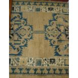 A Persian woollen cream ground hall runner, 300 x 85cmCondition report: Age related wear and