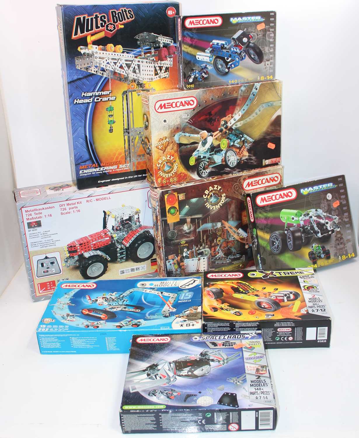 Eight Meccano set and two others:- nuts and bolts hammerhead crane (M), Tronic tractor (M),