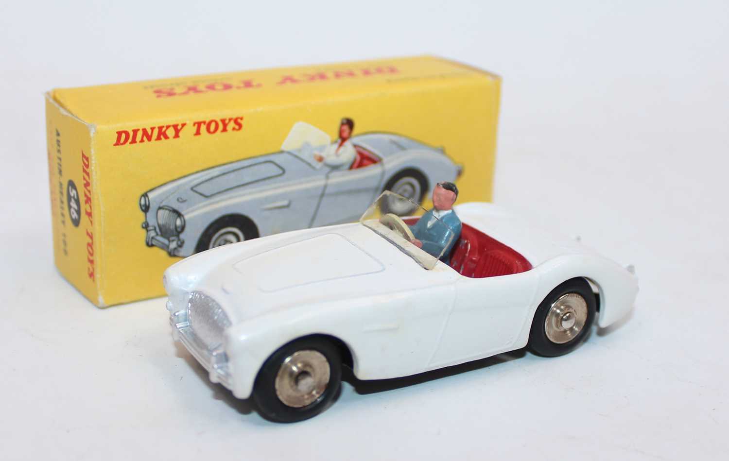 French Dinky 546 Austin Healey 100 sports car, matt white body, red interior with driver and wind-