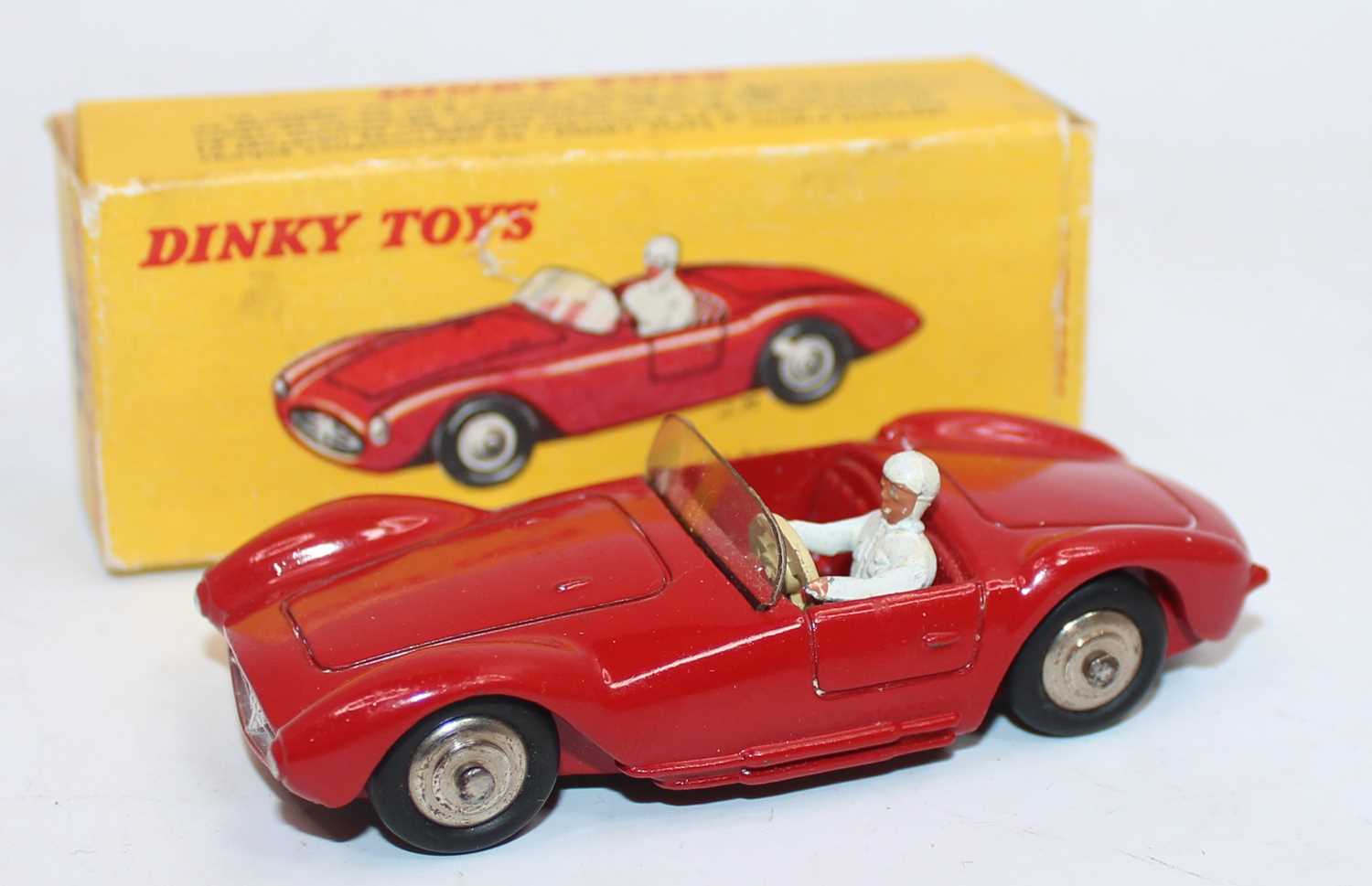 French Dinky Toys No. 22A Maserati Sport 2000 race car comprising of red body with spun hubs and