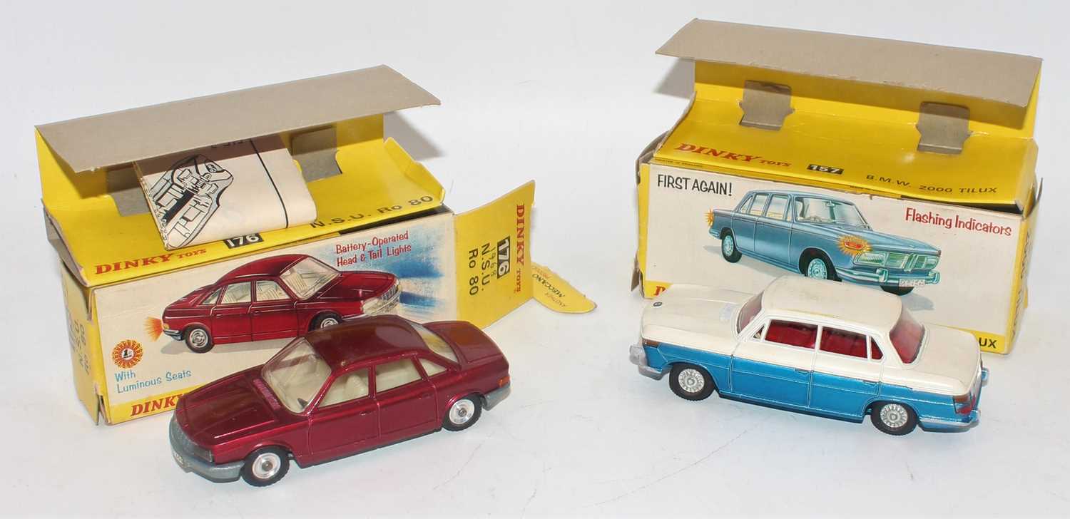 A Dinky Toys boxed saloon group to include a No. 157 BMW 2000 Tilux comprising of two tone white and