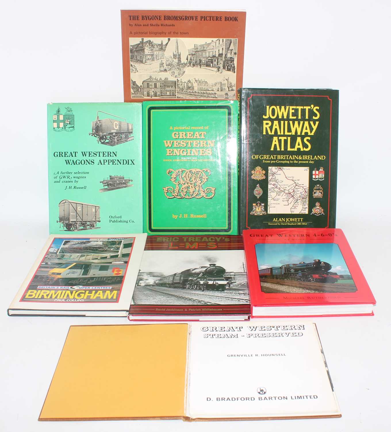 Eight railway books (E). Bias towards GWR and a copy of Jowett's Railway Atlas.