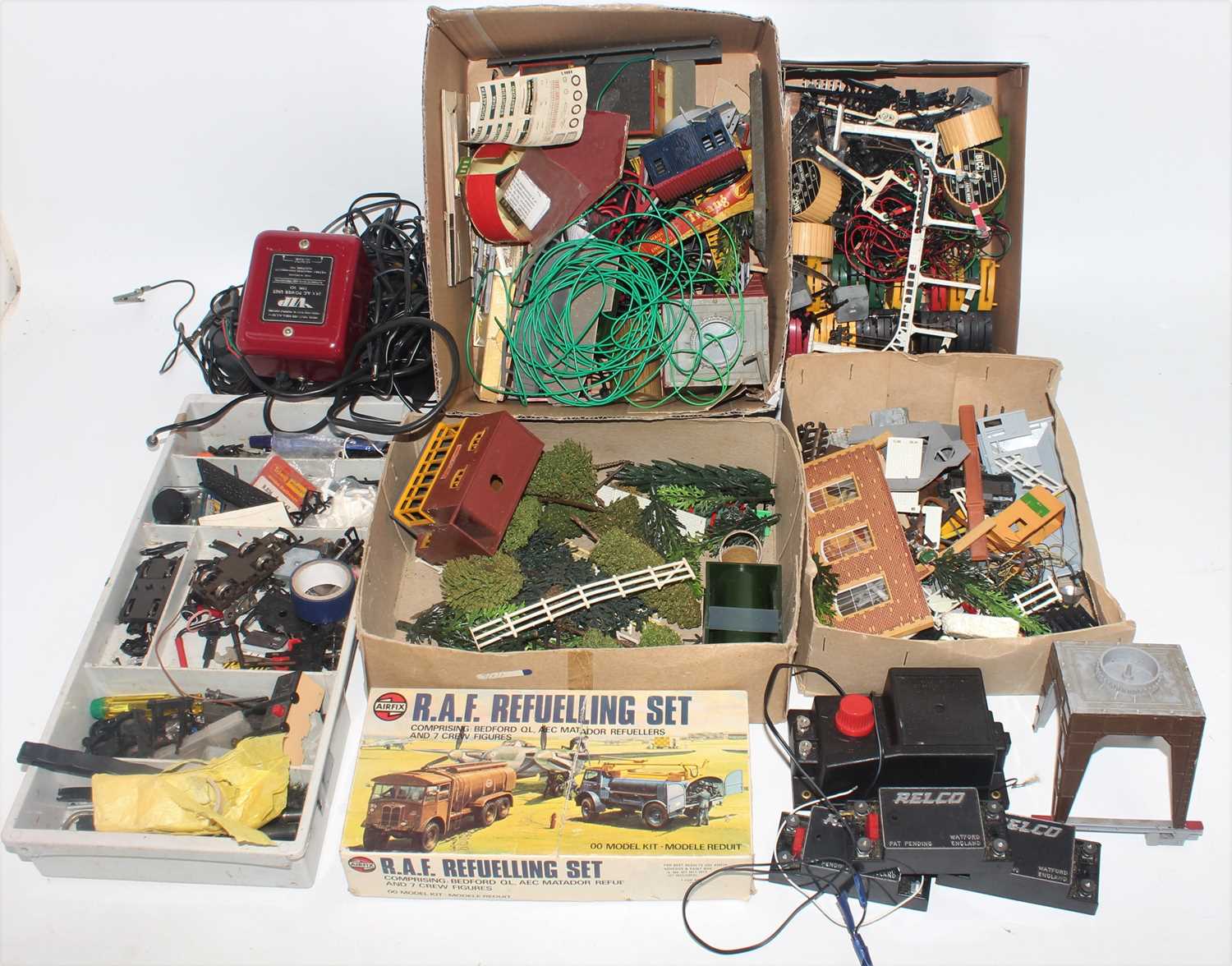 A large lidded plastic crate containing items from a modeller's workshop. Includes approx 30