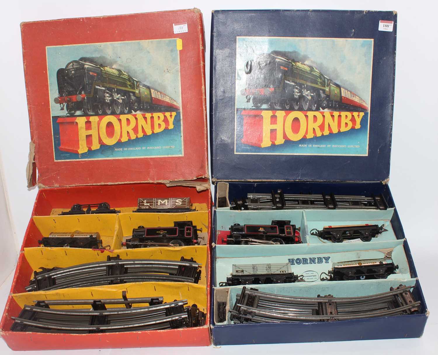 Two Hornby 'O' sets: 1954-8 No 40 tank goods comprising 0-4-0 c/w BR82011 loco (G) wih 3 wagons,