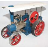 Wilesco steam tractor, blue body, white roof, red wheels, missing one front tyre, will benefit by