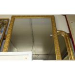 A reproduction gilt composition framed rectangular wall mirror, 114 x 90cm; and one other in