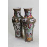 A pair of late Qing Dynasty famille rose vases, of slender baluster form, the everted rims above a