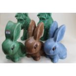 A Sylvac model of a seated long-eared bunny, model No.1028, h.25cm; together with two other similar;