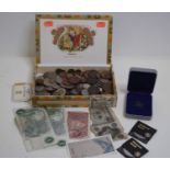 A collection of coins and bank notes to include Pobjoy Mint proof Isle of Man £1 coin, boxed with