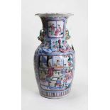 A late Qing Dynasty famille rose vase, of baluster form, the everted rim above shoulders with