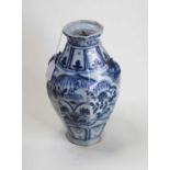 A Chinese export blue and white vase, of faceted form, the shoulders flanked by lion masks, the body