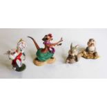 A collection of four Walt Disney Classics Collection figures, to include The Lion King, Luau! Timon,