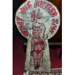 A polychrome painted wooden fairground totem 'What the Butler Saw', h.77cm