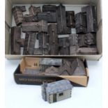 A small box of 23 miniature Brian Dollemore Ndd collection of houses all unboxed, made of bronze