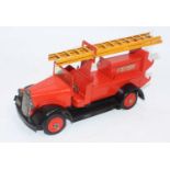 A Tekno No. 351 tinplate Falck fire engine comprising of orange to red body with black chassis and