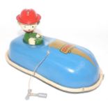 A Codeg of England tinplate and clockwork model of a Dodgem car, finished in blue with driver figure