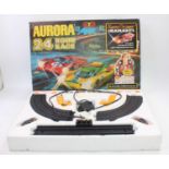 A collection of Aurora and Tyco miniature slot racing gift sets to include an Aurora AFX Jaguar