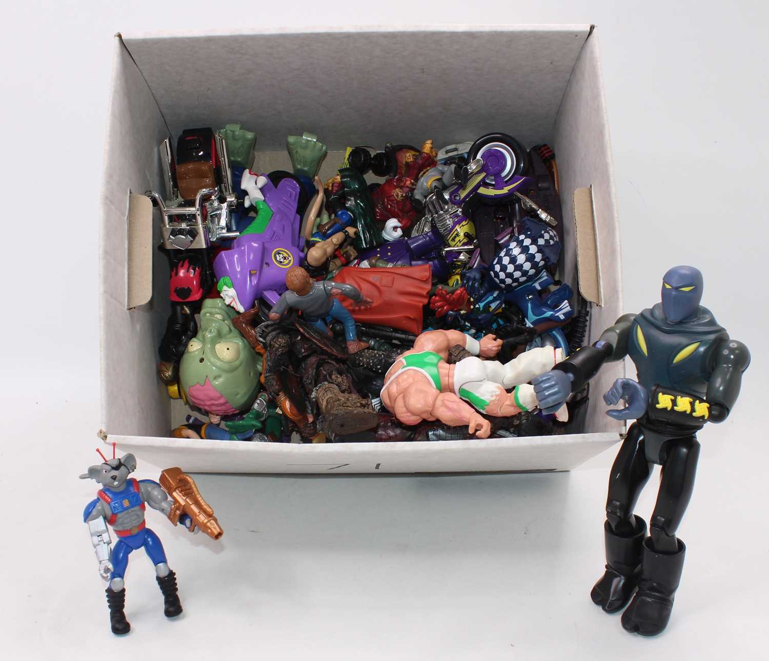 One box containing a quantity of various mixed action figures to include Batman, Dunk, Teenage