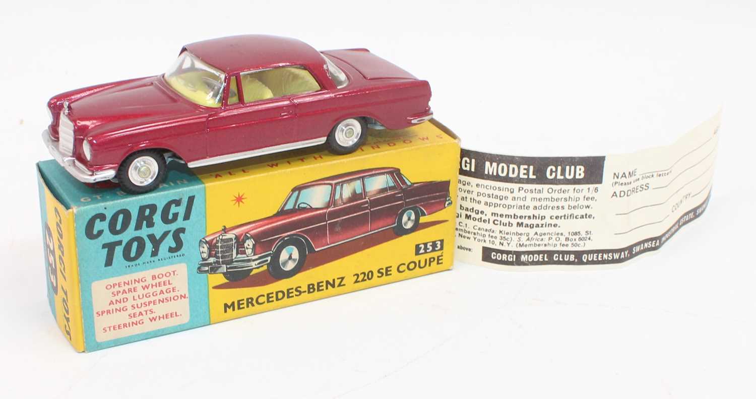 Corgi Toys No 253 Mercedes Benz 220 SE Coupe in wine red and fitted with a yellow interior (model