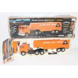 Nikko of Singapore No.80001 18-Wheeler Heavy Trucker, finished in orange and black and housed in the