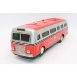 A Masudaya Modern Toys (MT Japan) battery-operated Sonicon Bus unboxed in good condition, orange