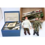 A small box of various Action Man figures and accessories. includes guns and snowshoes and many