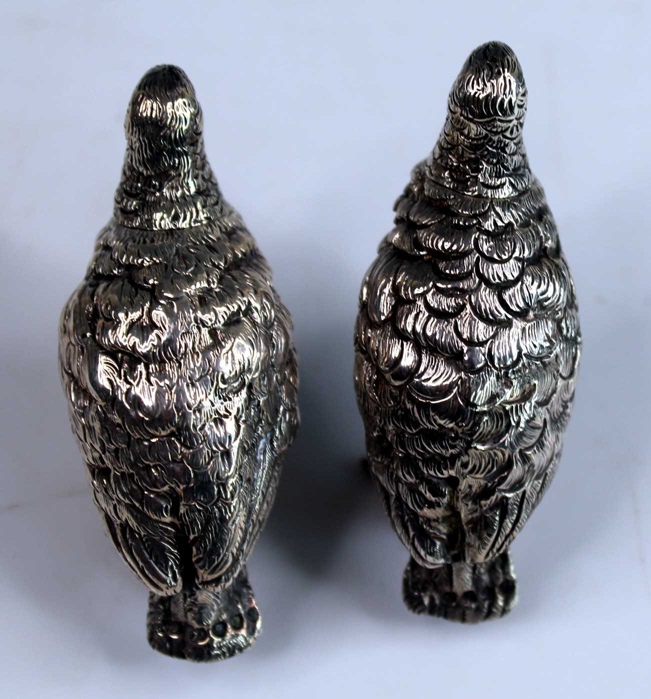 A pair of Victorian novelty silver salt and pepper cruets modelled as standing grouse, with - Image 4 of 9