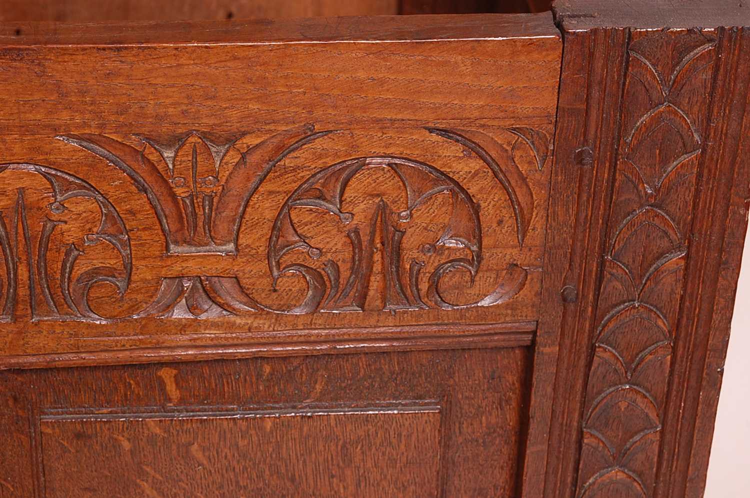 A circa 1700 joined oak four-panel coffer, the two plank top on original steel loop hinges, the - Image 6 of 7