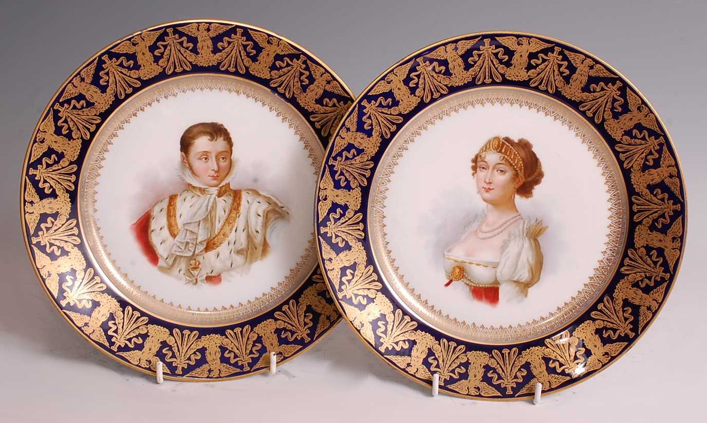 A pair of 19th century French porcelain portrait cabinet plates, the cobalt blue rims heavily gilt