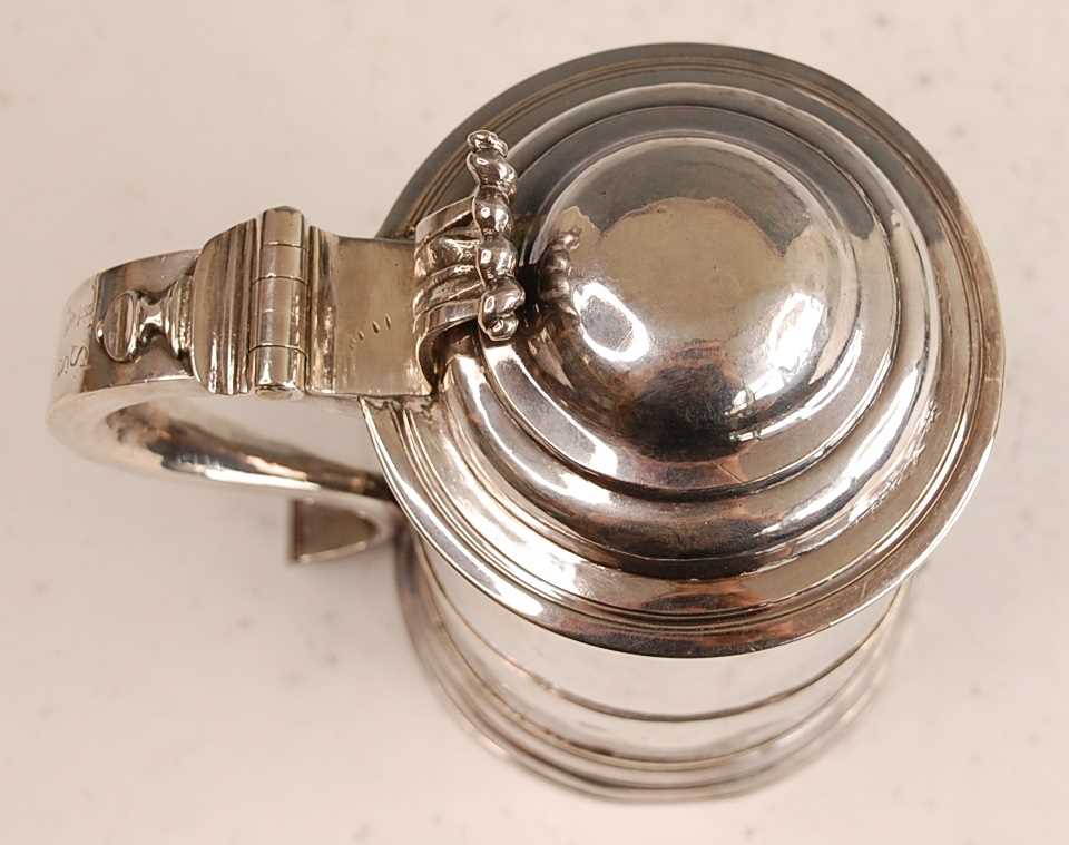 A George I silver lidded tankard, of plain tapering cylindrical form with banded girdle, having - Image 6 of 19