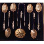 A late Victorian cased silver-gilt eight-piece apostle cutlery set, comprising six teaspoons with