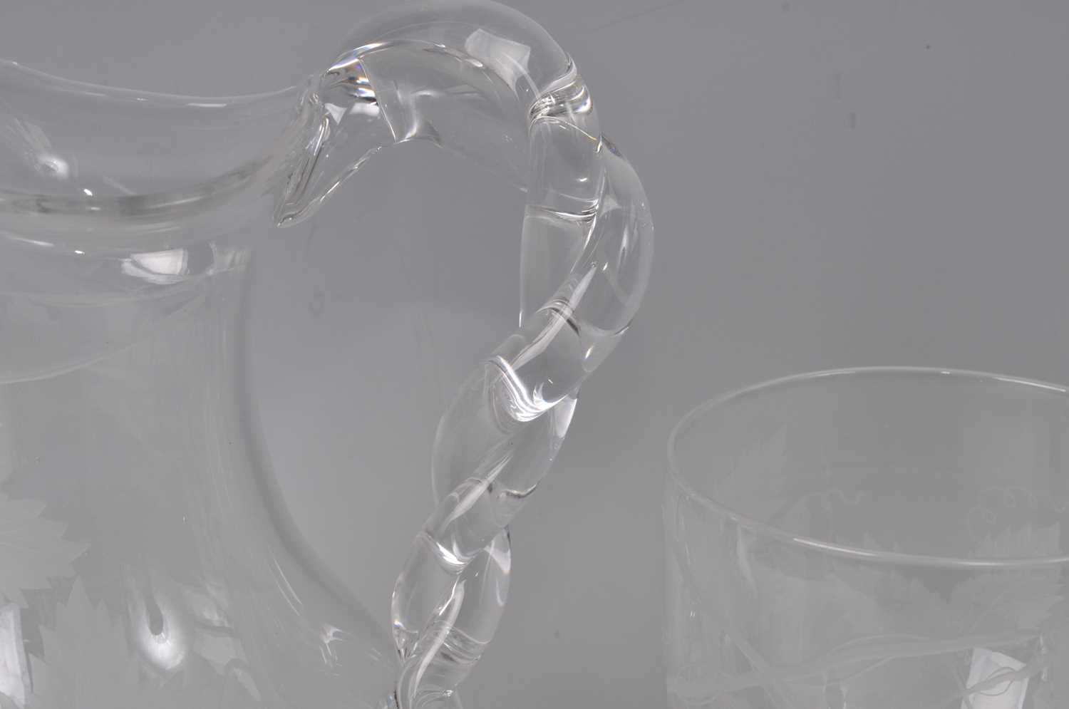 A Victorian glass wine jug, of baluster form with ropetwist handle, the whole acid etched with - Image 3 of 3