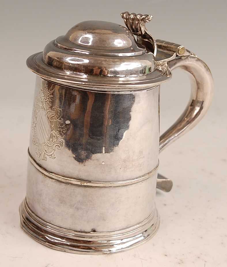 A George I silver lidded tankard, of plain tapering cylindrical form with banded girdle, having - Image 2 of 19