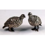 A pair of Victorian novelty silver salt and pepper cruets modelled as standing grouse, with