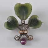 A Russian yellow and white metal shamrock brooch, comprising three carved nephrite jade leaves