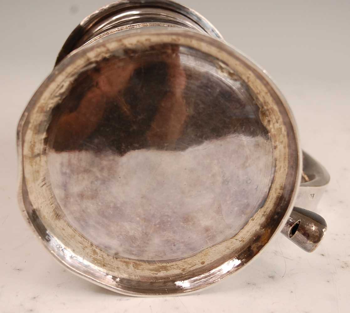 A George I silver lidded tankard, of plain tapering cylindrical form with banded girdle, having - Image 16 of 19