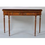 A walnut and figured walnut D-end hall table, having a cross and feather banded top over two