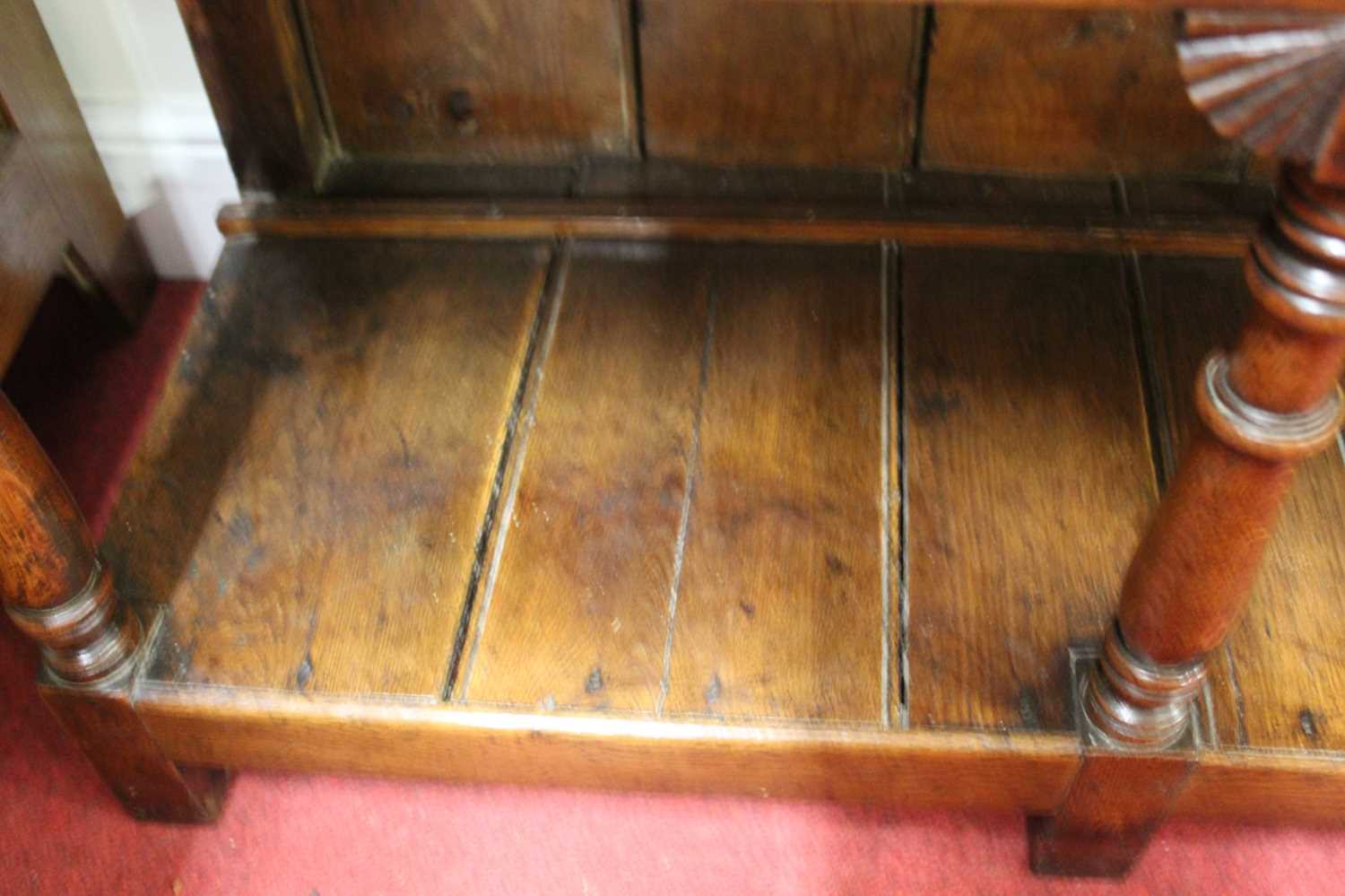 An 18th century oak dresser, the upper section having a two-tier plate rack with ironmongery to each - Image 9 of 13