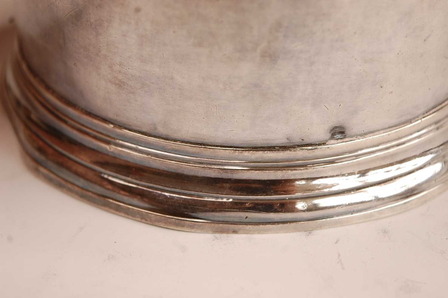 A George I silver lidded tankard, of plain tapering cylindrical form with banded girdle, having - Image 13 of 19