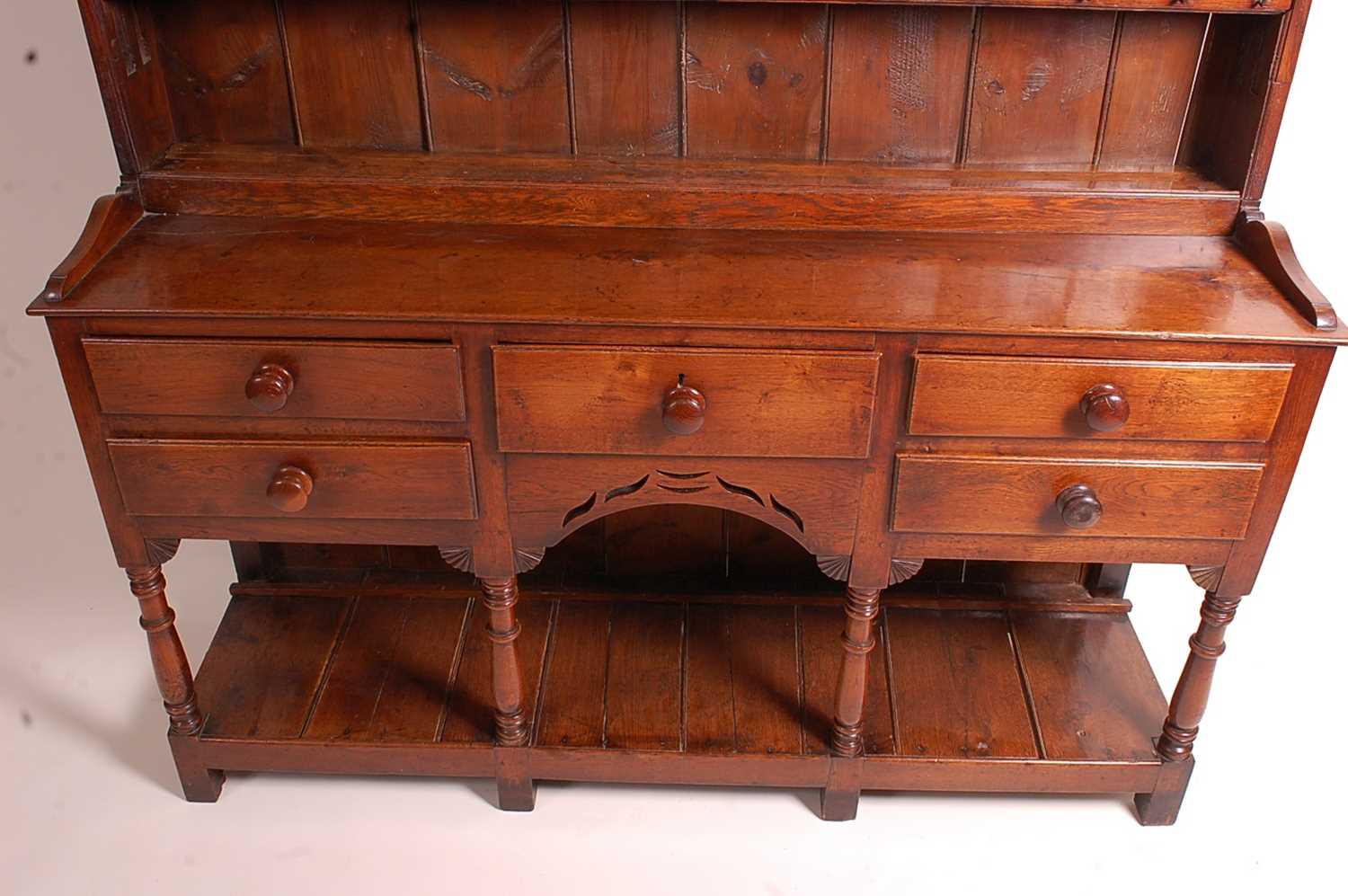 An 18th century oak dresser, the upper section having a two-tier plate rack with ironmongery to each - Image 2 of 13