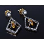 A pair of Art Deco style yellow metal, cultured pearl and diamond set ear pendants, of lozenge