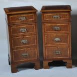 A pair of walnut and figured walnut bedside chests, each having a crossbanded top over four long