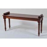 A Victorian style mahogany window seat, with turned ends and on ring turned tapering supports, w.