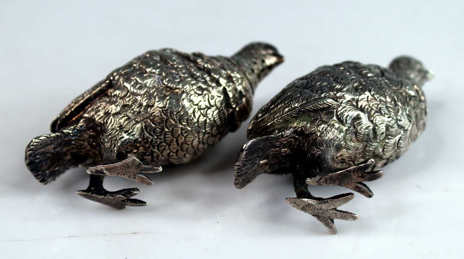 A pair of Victorian novelty silver salt and pepper cruets modelled as standing grouse, with - Image 5 of 9