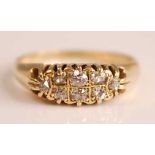 A late Victorian 18ct yellow gold diamond dress ring, comprising a boat-shaped head with eight Old
